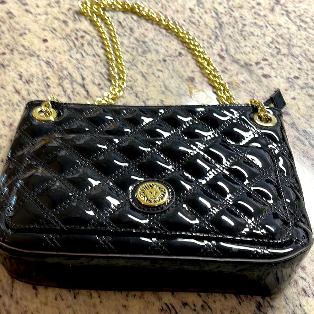 Anna Klein Black crossover or shoulder purse logo On exterior and interior